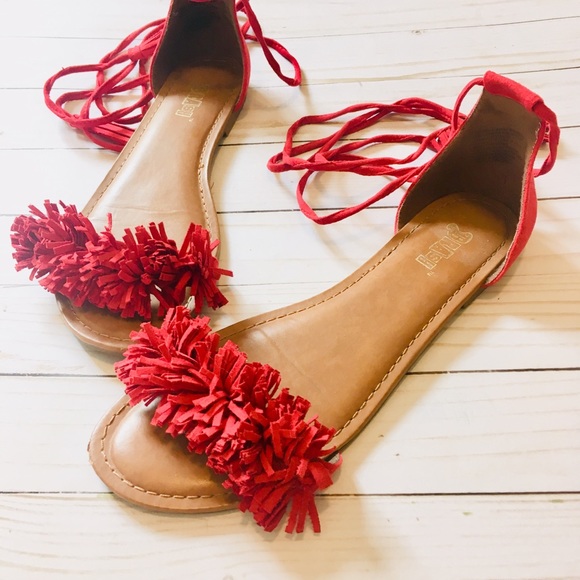 red fringe flat sandals